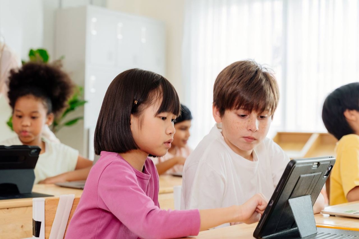 Kids learning on tablets